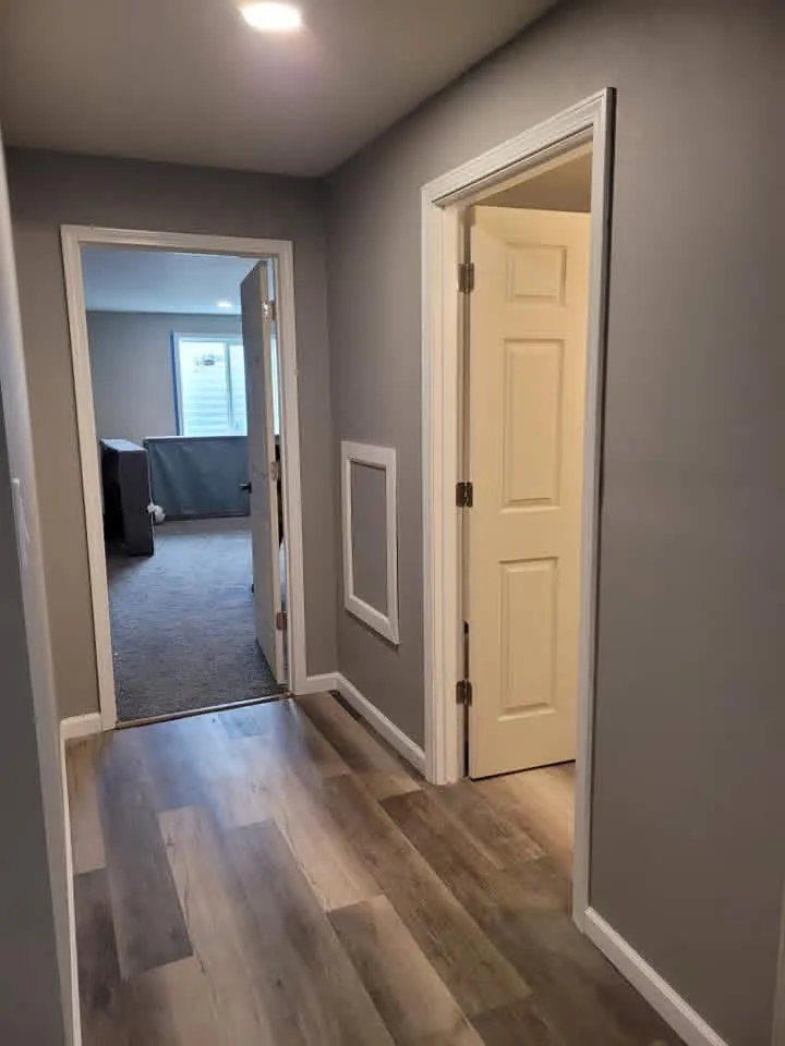 Freshly painted basement hallway with new doors and trim, Sioux Falls SD